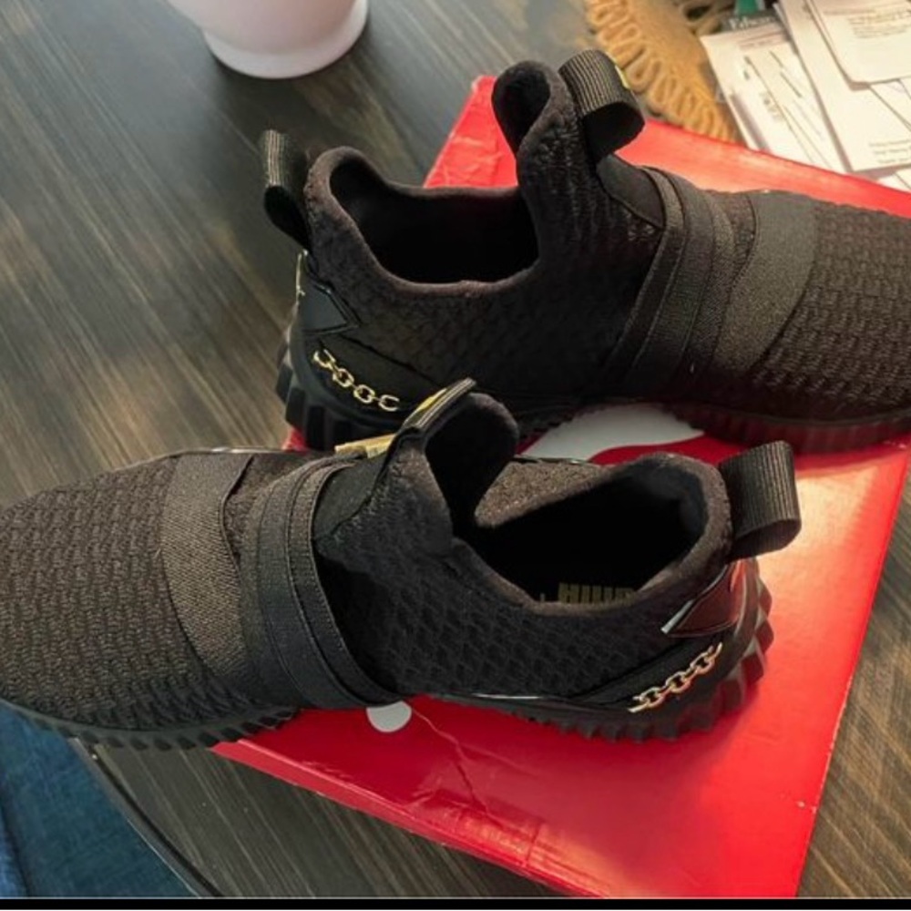 New inbox, mid Defy woman size 7.5 black with gold sneakers shoes slip on